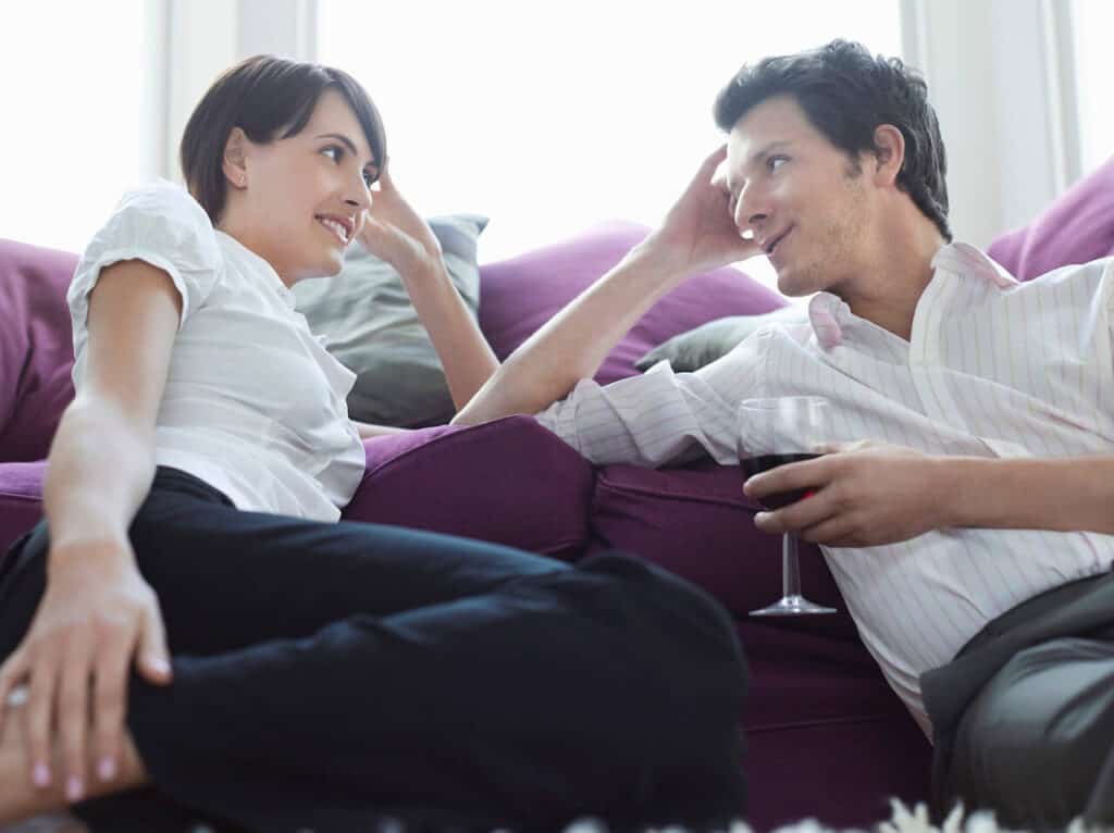 couple talking on couch 