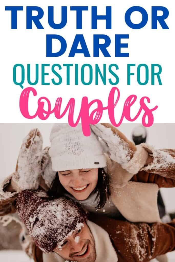 text reads "truth or dare questions for couples" with photo of couple laying in the snow.